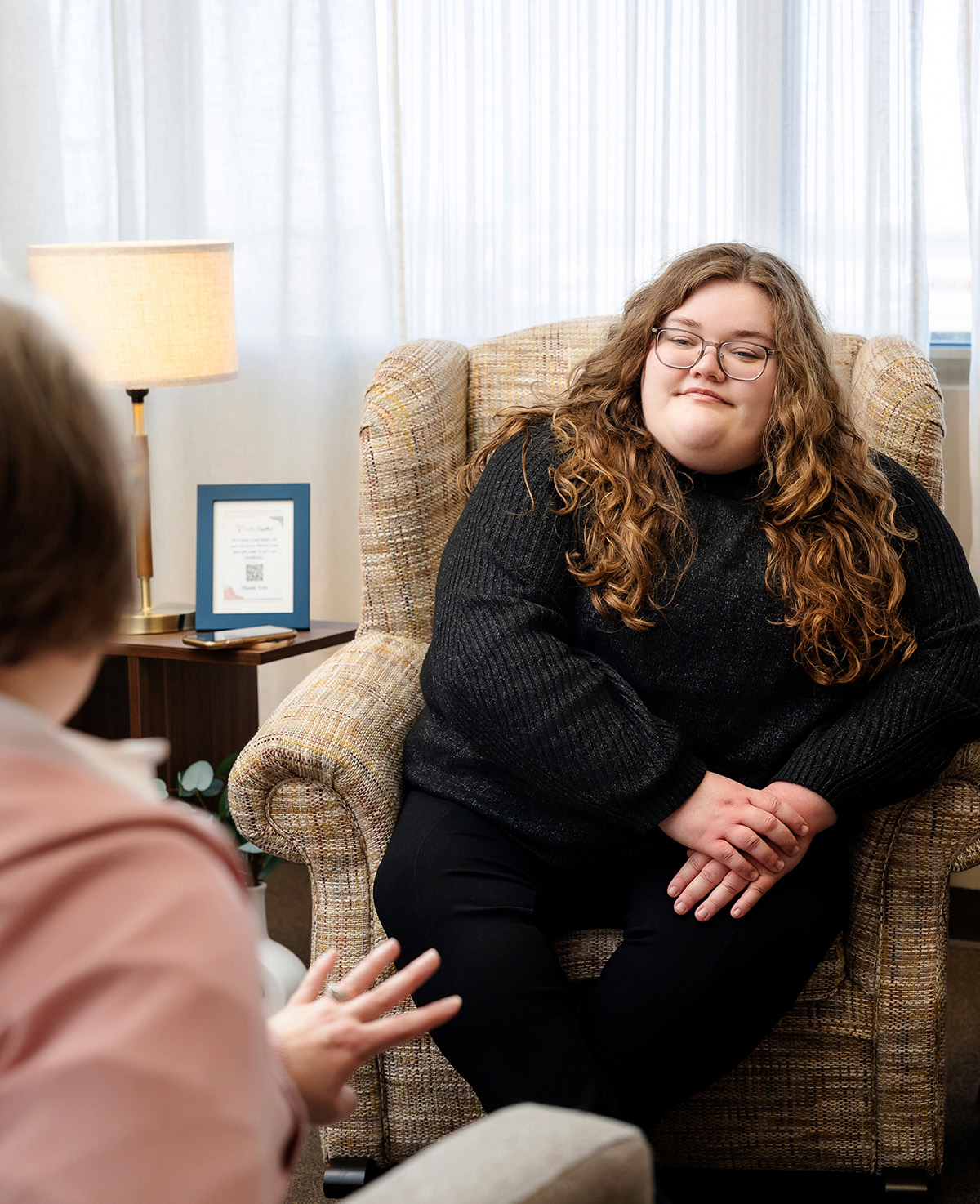 Maddy listens intently in the Better Together Mental Health offices located on the south side of Columbia, Missouri.