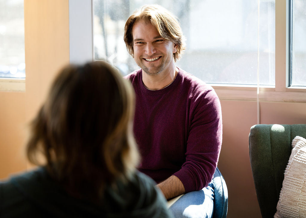 Evoto Maddy listens intently in the Better Together Mental Health offices located on the south side of Columbia, Missouri.